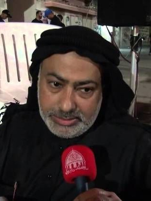 علي العويناتي